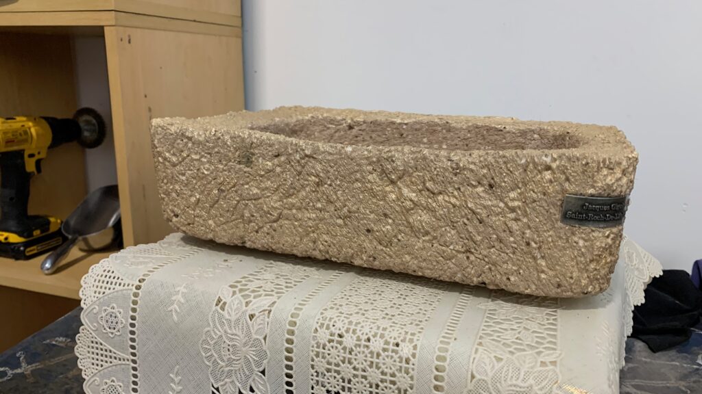 A handcrafted hypertufa pot, fully dried and ready for use
